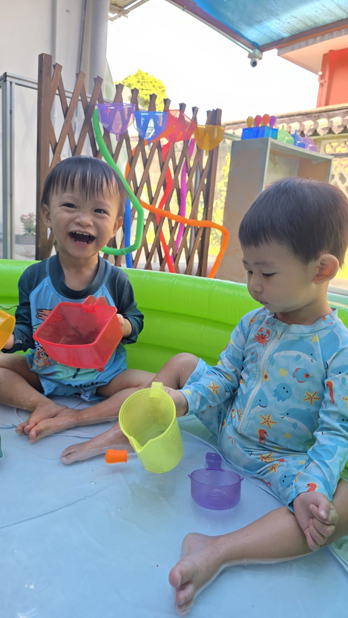 Sensory water play exploration at Genius Gems Childcare Centre